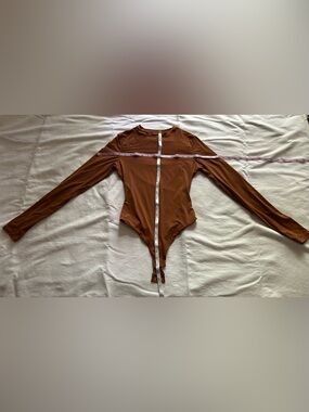 SKIMS Long Sleeve Crew Bodysuit in Brown